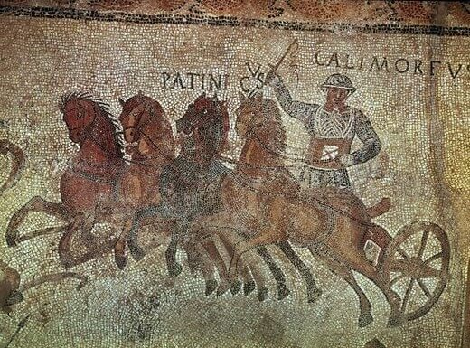 Mosaico que muestra a un auriga en plena carrera