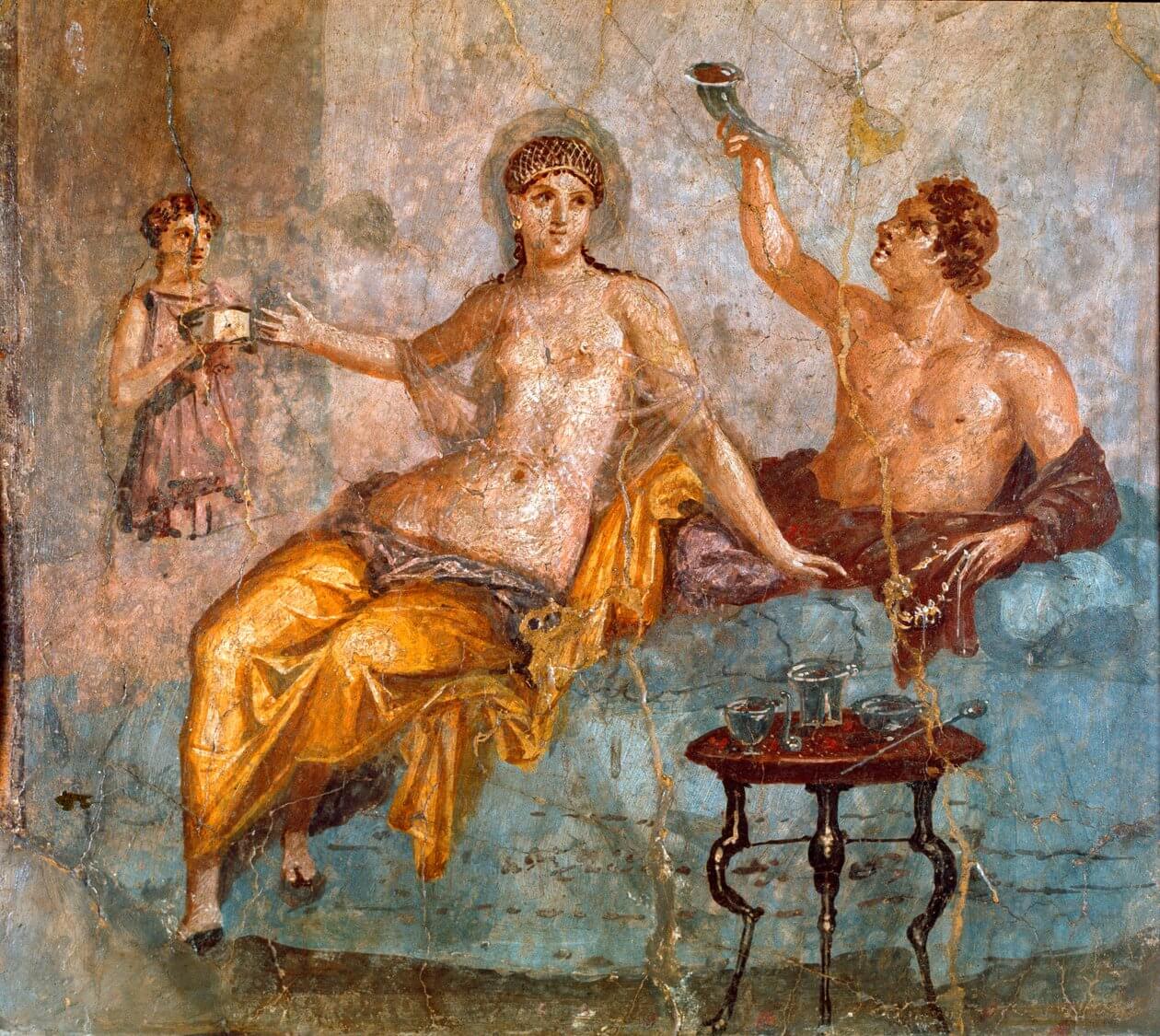 Pintura pompeyana con una escena de banquete