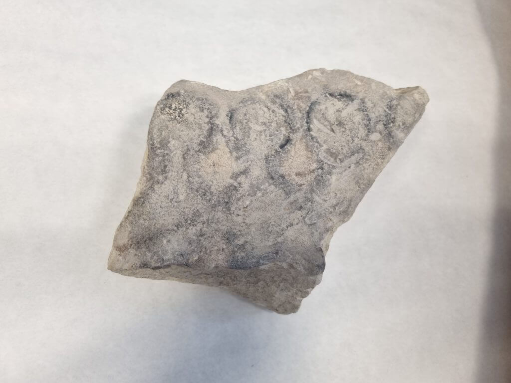 Molde de acuñación de monedas romanas hallado en Obulco (Porcuna)